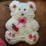 Floral tribute Teddy Bear